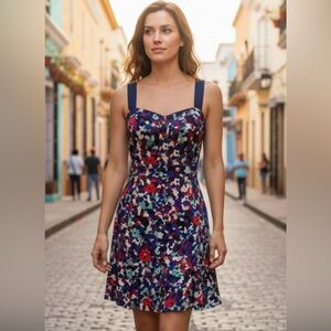 Vintage Tory Burch floral dress. Great shape. Zipper and clasp intact.